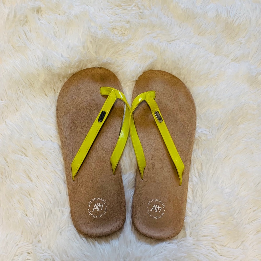 Neon green flip flops